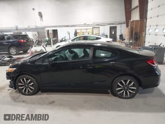 ✅ 2015 Honda Civic EX-L • VIN: 2HGFG3B04FH519305 • Lot: 43135309. Listed on IAAI with 126,201 mi. Free auction sales archive from the USA and detailed vehicle history report at DreamBid. Image 14.