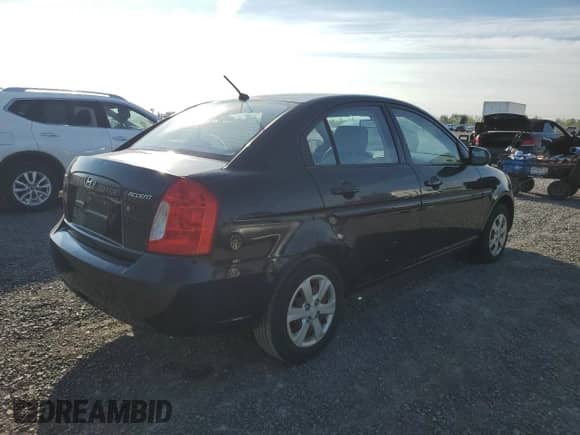 2010 Hyundai Accent GL z VIN KMHCN4BC3AU467108, wystawiony jako Copart lot #81237345 z przebiegiem 143 596 mil mil oraz Czysty tytuł • Clean title. Historia ofert i sprzedaży dostępna na DreamBid. Obrazek 3.