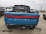 ✅ 2023 Rivian R1T Launch Edition • VIN: 7FCTGAAL7PN019188 • Lot: 55100405. Listed on Copart with 13,654 mi. Free auction sales archive from the USA and detailed vehicle history report at DreamBid. Image 6.