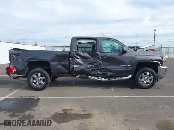 ✅ 2015 Chevrolet Silverado 2500HD LT • VIN: 1GC1KVEG2FF610053 • Lot: 43469299. Listed on IAAI with 173,702 mi. Free auction sales archive from the USA and detailed vehicle history report at DreamBid. Image 13.