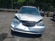 ✅ 2005 Toyota Corolla CE • VIN: JTDBR32E250055971 • Lot: 42660536. Listed on IAAI with 299,999 mi. Free auction sales archive from the USA and detailed vehicle history report at DreamBid. Image 12.