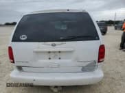 ✅ 1999 Chrysler Town & Country LXi • VIN: 1C4GP64L2XB779000 • Lot: 75893594. Listed on Copart with 109,619 mi. Free auction sales archive from the USA and detailed vehicle history report at DreamBid. Image 6.