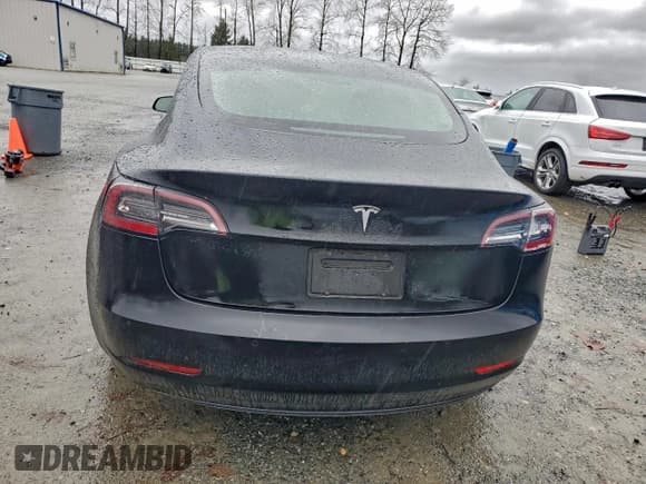 ✅ 2022 Tesla Model 3 • VIN: 5YJ3E1EA8NF370000 • Lot: 95893255. Listed on Copart with 106,623 mi. Free auction sales archive from the USA and detailed vehicle history report at DreamBid. Image 6.