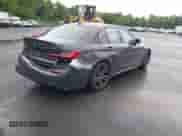 2022 BMW 3 Series 330i xDrive with VIN WBA5R7C05NFM16689, listed as a IAAI auction lot 42530938 with 56,777 mi miles and . Bid and sale history available at DreamBid. Image 4.