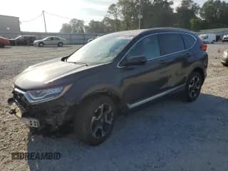 ✅ 2017 Honda CR-V Touring • VIN: 5J6RW1H90HL016248 • Лот: 81728235. Опубликован ранее на Copart с пробегом 100 365 миль. Бесплатный доступ к архиву аукционных продаж из США и подробный отчёт об истории автомобиля на DreamBid. Изображение 1.
