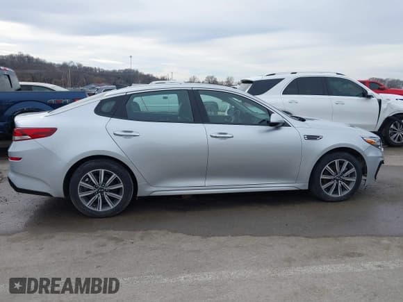 ✅ 2020 Kia Optima EX Premium • VIN: 5XXGU4L15LG413176 • Лот: 41619443. Опубликован ранее на IAAI с пробегом 56 141 миль. Бесплатный доступ к архиву аукционных продаж из США и подробный отчёт об истории автомобиля на DreamBid. Изображение 14.