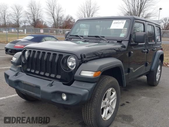 ✅ 2022 Jeep Wrangler Unlimited Willys Sport • VIN: 1C4HJXDN3NW132771 • Lot: 41052274. Listed on IAAI with 33,302 mi. Free auction sales archive from the USA and detailed vehicle history report at DreamBid. Image 2.