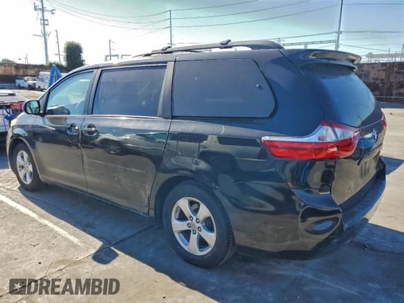 ✅ 2015 Toyota Sienna LE • VIN: 5TDKK3DC2FS664704 • Lot: 95775925. Listed on Copart with 182,327 mi. Free auction sales archive from the USA and detailed vehicle history report at DreamBid. Image 2.