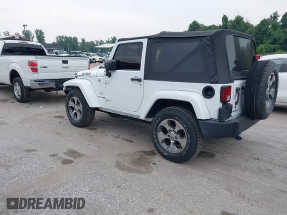 ✅ 2018 Jeep Wrangler Sahara • VIN: 1C4AJWBG1JL809098 • Lot: 42875034. Listed on IAAI with 24,297 mi. Free auction sales archive from the USA and detailed vehicle history report at DreamBid. Image 3.