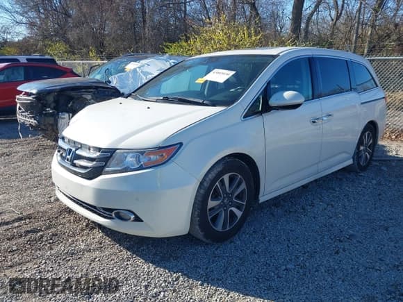 ✅ 2015 Honda Odyssey Touring Elite • VIN: 5FNRL5H99FB074655 • Lot: 43803030. Listed on IAAI with 153,633 mi. Free auction sales archive from the USA and detailed vehicle history report at DreamBid. Image 2.