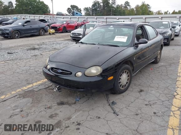 ✅ 1998 Ford Taurus SE Comfort • VIN: 1FAFP53S0WG125666 • Lot: 43381901. Wystawiony na IAAI z przebiegiem 196 646 mil. Bezpłatny archiwum sprzedaży aukcyjnych z USA i szczegółowy raport historii pojazdu na DreamBid. Zdjęcie 2.