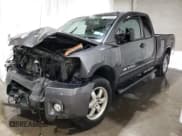 ✅ 2012 Nissan Titan SV • VIN: 1N6AA0CC7CN318757 • Lot: 73329344. Listed on Copart with 142,392 mi. Free auction sales archive from the USA and detailed vehicle history report at DreamBid. Image 1.