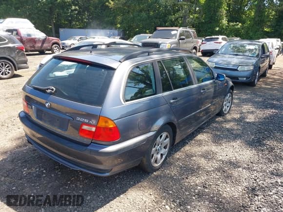 ✅ 2003 BMW 3 Series 325xi • VIN: WBAEP33443PF02247 • Lot: 42560000. Listed on IAAI with 143,766 mi. Free auction sales archive from the USA and detailed vehicle history report at DreamBid. Image 4.