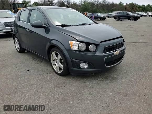 2016 Chevrolet Sonic LTZ z VIN 1G1JE6SB2G4160576, wystawiony jako Copart lot #63419694 z przebiegiem 110 572 mil mil oraz Szkoda całkowita • Salvage title. Historia ofert i sprzedaży dostępna na DreamBid. Obrazek 11.