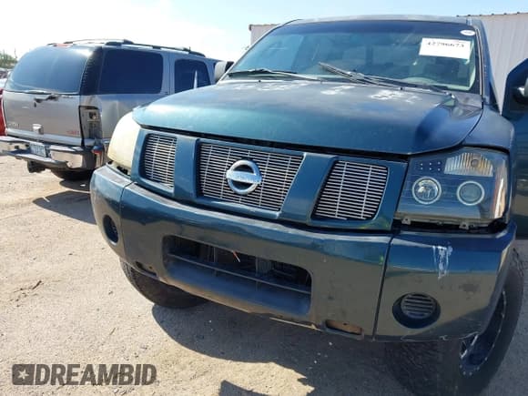 ✅ 2005 Nissan Titan LE • VIN: 1N6AA07A55N560927 • Lot: 42796673. Wystawiony na IAAI z przebiegiem 209 961 mil. Bezpłatny archiwum sprzedaży aukcyjnych z USA i szczegółowy raport historii pojazdu na DreamBid. Zdjęcie 6.