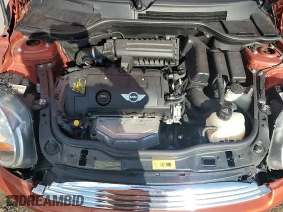 2012 MINI Hardtop с VIN WMWSU3C5XCT369762, выставлен на аукционе Copart как лот 84535095 с пробегом 59 935 миль миль и Списание • Salvage title. История ставок и продаж доступна на DreamBid. Изображение 11.