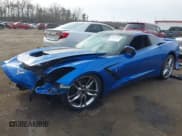 ✅ 2014 Chevrolet Corvette Z51 3LT • VIN: 1G1YM2D77E5120729 • Lot: 41821347. Listed on IAAI with 19,747 mi. Free auction sales archive from the USA and detailed vehicle history report at DreamBid. Image 2.