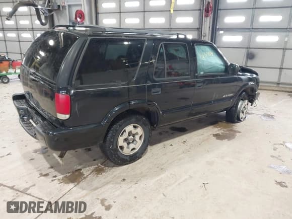 ✅ 2002 Chevrolet Blazer LS • VIN: 1GNDT13W72K232625 • Lot: 41551854. Wystawiony na IAAI z przebiegiem 123 498 mil. Bezpłatny archiwum sprzedaży aukcyjnych z USA i szczegółowy raport historii pojazdu na DreamBid. Zdjęcie 4.