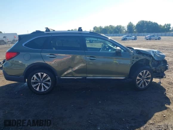 ✅ 2018 Subaru Outback Touring • VIN: 4S4BSETC2J3298701 • Lot: 43314263. Listed on IAAI with 125,125 mi. Free auction sales archive from the USA and detailed vehicle history report at DreamBid. Image 14.