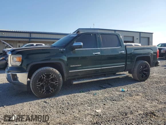 ✅ 2015 GMC Sierra 1500 SLT • VIN: 3GTU2VEJ0FG414894 • Lot: 65009405. Listed on Copart with 106,724 mi. Free auction sales archive from the USA and detailed vehicle history report at DreamBid. Image 1.