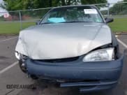 ✅ 1999 Toyota Corolla VE • VIN: 2T1BR12E9XC180124 • Lot: 42989717. Listed on IAAI with 184,062 mi. Free auction sales archive from the USA and detailed vehicle history report at DreamBid. Image 6.