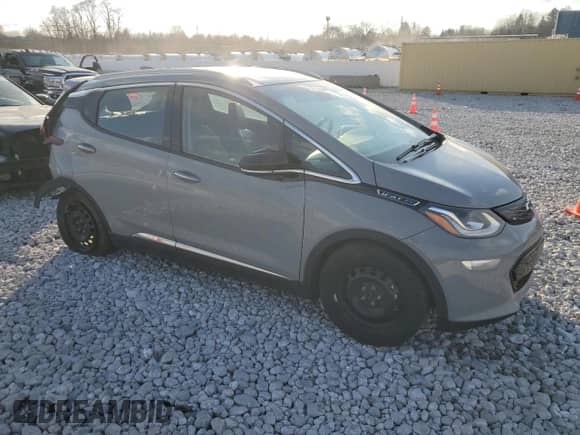 2021 Chevrolet Bolt EV Premier with VIN 1G1FZ6S07M4104928, listed as a Copart auction lot 42057654 with 57,263 mi miles and . Bid and sale history available at DreamBid. Image 4.