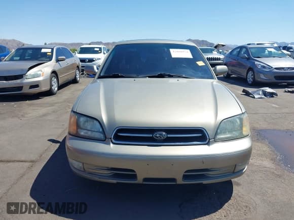 ✅ 2002 Subaru Legacy • VIN: 4S3BE645727200144 • Lot: 42860974. Listed on IAAI with 92,541 mi. Free auction sales archive from the USA and detailed vehicle history report at DreamBid. Image 12.