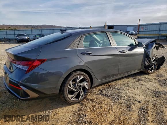 ✅ 2024 Hyundai Elantra Limited • VIN: KMHLP4DG7RU757258 • Lot: 94716975. Listed on Copart with 58,749 mi. Free auction sales archive from the USA and detailed vehicle history report at DreamBid. Image 3.