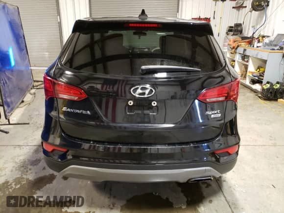 ✅ 2017 Hyundai Santa Fe 2.4L • VIN: 5XYZTDLB9HG428349 • Lot: 71303772. Wystawiony na Copart z przebiegiem 53 868 mil mil. Skorzystaj z bezpłatnego archiwum sprzedaży aukcyjnych z USA i zobacz szczegółowy raport historii pojazdu na DreamBid. Zdjęcie 6.
