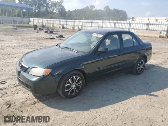✅ 2002 Mazda Protege DX • VIN: JM1BJ225320553643 • Lot: 67915724. Wystawiony na Copart z przebiegiem 139 899 mil. Bezpłatny archiwum sprzedaży aukcyjnych z USA i szczegółowy raport historii pojazdu na DreamBid. Zdjęcie 1.
