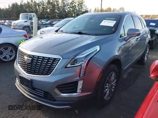 ✅ 2021 Cadillac XT5 AWD Premium Luxury • VIN: 1GYKNDRS8MZ211478 • Лот: 43740564. Опубликован ранее на IAAI с пробегом 57 705 миль. Бесплатный доступ к архиву аукционных продаж из США и подробный отчёт об истории автомобиля на DreamBid. Изображение 2.