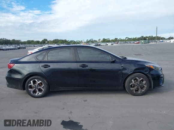 ✅ 2019 Kia Forte LXS • VIN: 3KPF24AD6KE052272 • Lot: 43802809. Listed on IAAI with 126,036 mi. Free auction sales archive from the USA and detailed vehicle history report at DreamBid. Image 13.