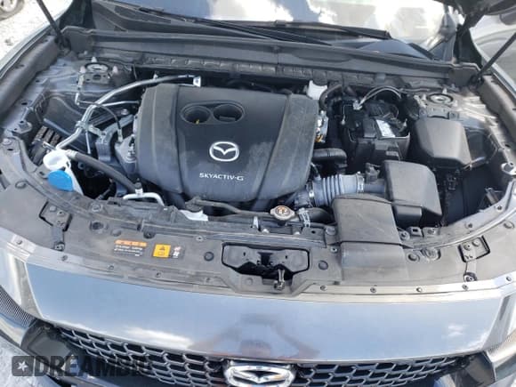 ✅ 2023 Mazda CX-50 S Premium Plus • VIN: 7MMVABEM8PN136223 • Lot: 71307085. Listed on Copart with 22,401 mi. Free auction sales archive from the USA and detailed vehicle history report at DreamBid. Image 12.