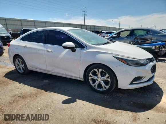 2017 Chevrolet Cruze Premier с VIN 1G1BF5SM5H7247515, выставлен на аукционе Copart как лот 71837375 с пробегом 141 252 миль миль и Списание • Salvage title. История ставок и продаж доступна на DreamBid. Изображение 4.