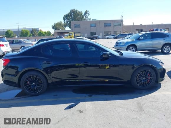 ✅ 2015 Maserati Ghibli • VIN: ZAM57XSA1F1140895 • Лот: 42666874. Опубликован ранее на IAAI с пробегом 86 110 миль. Бесплатный доступ к архиву аукционных продаж из США и подробный отчёт об истории автомобиля на DreamBid. Изображение 13.