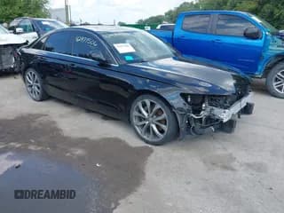 ✅ 2014 Audi A6 Premium Plus • VIN: WAUGFAFC7EN089139 • Lot: 42971506. Wystawiony na IAAI z przebiegiem 147 390 mil. Bezpłatny archiwum sprzedaży aukcyjnych z USA i szczegółowy raport historii pojazdu na DreamBid. Zdjęcie 1.