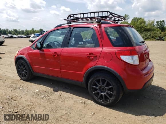 ✅ 2011 Suzuki SX4 Crossover • VIN: JS2YB5A38B6303388 • Лот: 68082725. Опубликован ранее на Copart с пробегом 219 750 миль. Бесплатный доступ к архиву аукционных продаж из США и подробный отчёт об истории автомобиля на DreamBid. Изображение 2.