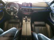 ✅ 2018 BMW M5 • VIN: WBSJF0C52JB283137 • Lot: 82362285. Listed on Copart with 69,963 mi. Free auction sales archive from the USA and detailed vehicle history report at DreamBid. Image 8.