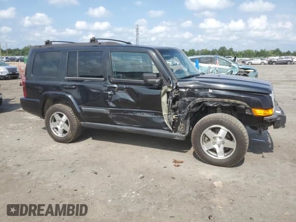 ✅ 2009 Jeep Commander Sport • VIN: 1J8HG48K39C501268 • Lot: 64312325. Listed on Copart with 184,794 mi. Free auction sales archive from the USA and detailed vehicle history report at DreamBid. Image 4.