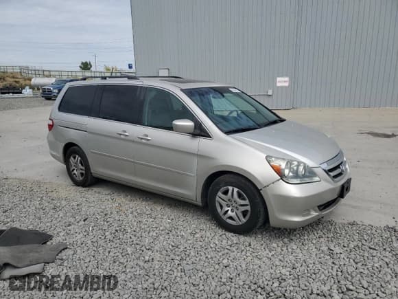✅ 2006 Honda Odyssey EX-L • VIN: 5FNRL38656B410666 • Лот: 80554015. Опубликован ранее на Copart с пробегом 243 001 миль. Бесплатный доступ к архиву аукционных продаж из США и подробный отчёт об истории автомобиля на DreamBid. Изображение 4.