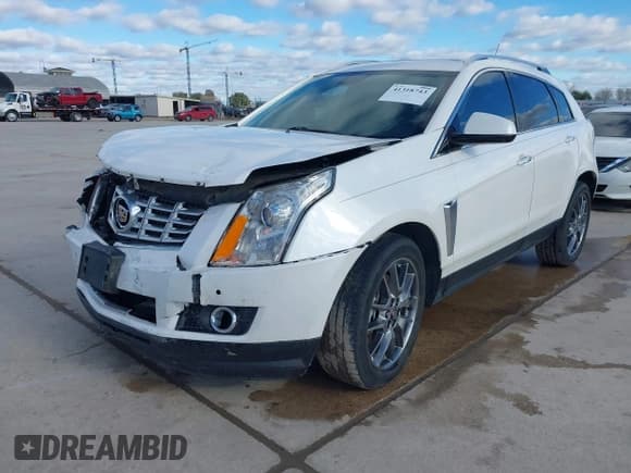 ✅ 2016 Cadillac SRX Performance Collection • VIN: 3GYFNCE39GS565215 • Lot: 41318743. Listed on IAAI with 46,063 mi. Free auction sales archive from the USA and detailed vehicle history report at DreamBid. Image 2.