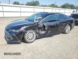 ✅ 2022 Toyota Avalon Limited • VIN: 4T1DZ1FB9NU072042 • Лот: 84975475. Опубликован ранее на Copart с пробегом 90 635 миль. Бесплатный доступ к архиву аукционных продаж из США и подробный отчёт об истории автомобиля на DreamBid. Изображение 1.