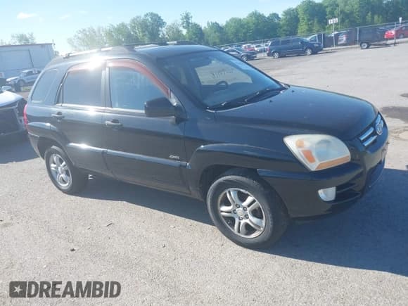 ✅ 2008 Kia Sportage LX • VIN: KNDJE723087470411 • Lot: 42294418. Listed on IAAI with 186,368 mi. Free auction sales archive from the USA and detailed vehicle history report at DreamBid. Image 1.