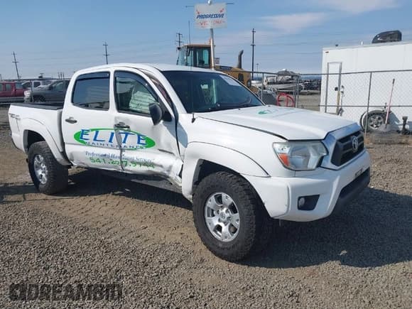 ✅ 2014 Toyota Tacoma PreRunner • VIN: 3TMJU4GN7EM158230 • Lot: 40010521. Listed on IAAI with 145,185 mi. Free auction sales archive from the USA and detailed vehicle history report at DreamBid. Image 1.