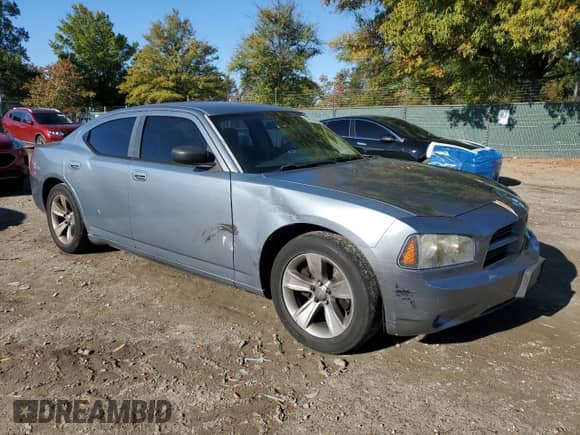 2007 Dodge Charger z VIN 2B3KA43RX7H621552, wystawiony jako Copart lot #86513765 z przebiegiem 154 731 mil mil oraz Szkoda całkowita • Salvage title. Historia ofert i sprzedaży dostępna na DreamBid. Obrazek 4.