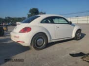 ✅ 2013 Volkswagen Beetle Fender Edition • VIN: 3VWJP7AT0DM670052 • Lot: 68022534. Listed on Copart with 59,490 mi. Free auction sales archive from the USA and detailed vehicle history report at DreamBid. Image 3.