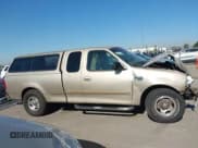 ✅ 1999 Ford F-150 XL • VIN: 1FTRX17L4XKB16941 • Lot: 43818016. Wystawiony na IAAI z przebiegiem Nie podano. Bezpłatny archiwum sprzedaży aukcyjnych z USA i szczegółowy raport historii pojazdu na DreamBid. Zdjęcie 13.