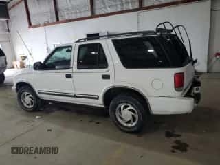 2001 Chevrolet Blazer LT z VIN 1GNDT13W91K224444, wystawiony jako Copart lot #81615015 z przebiegiem 225 699 mil mil oraz Szkoda całkowita • Salvage title. Historia ofert i sprzedaży dostępna na DreamBid. Obrazek 2.