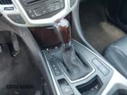 ✅ 2010 Cadillac SRX Performance Collection • VIN: 3GYFNBEY4AS627889 • Lot: 42381750. Wystawiony na IAAI z przebiegiem 138 612 mil. Bezpłatny archiwum sprzedaży aukcyjnych z USA i szczegółowy raport historii pojazdu na DreamBid. Zdjęcie 13.