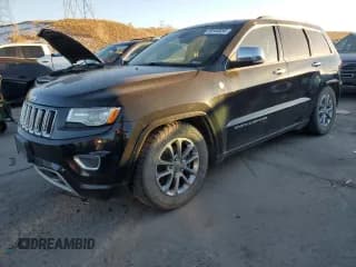 ✅ 2015 Jeep Grand Cherokee Overland • VIN: 1C4RJFCMXFC618455 • Lot: 80548554. Listed on Copart with 175,413 mi. Free auction sales archive from the USA and detailed vehicle history report at DreamBid. Image 1.